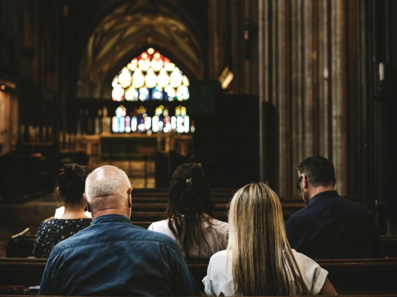 Churchgoers sitting in the pew